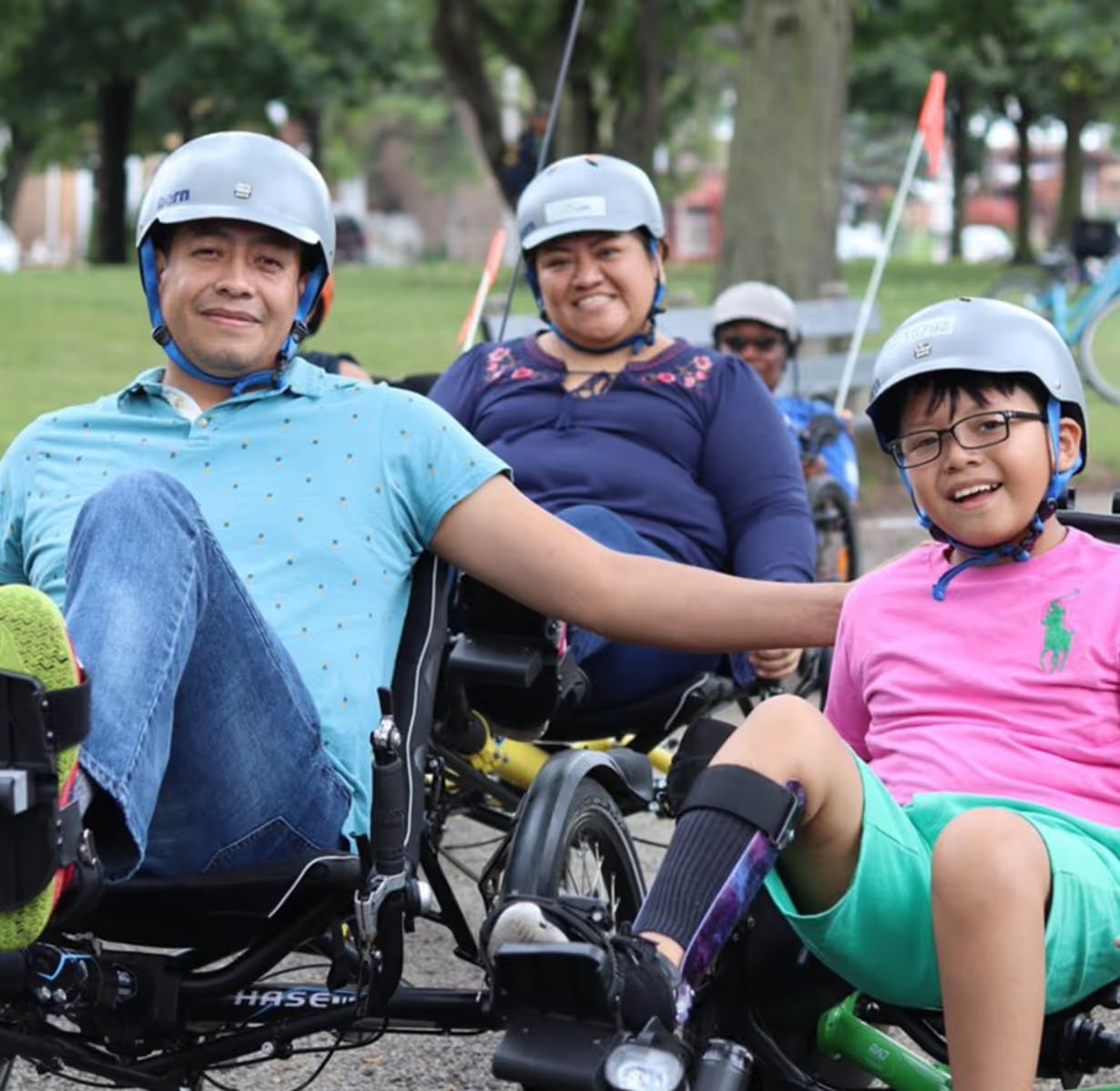 Adaptive Adventures participants smiling together at an outdoor program